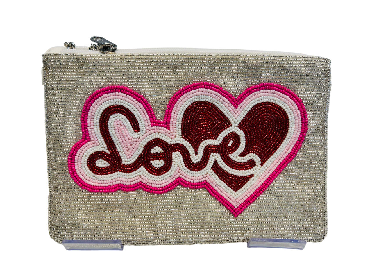 The Love and Hearts Hand-Beaded Zipper Clutch is a handcrafted beige pouch featuring “Love” in pink and red seed beads with a heart design, detailed beadwork, secure top zipper, and includes 46 detachable pieces.